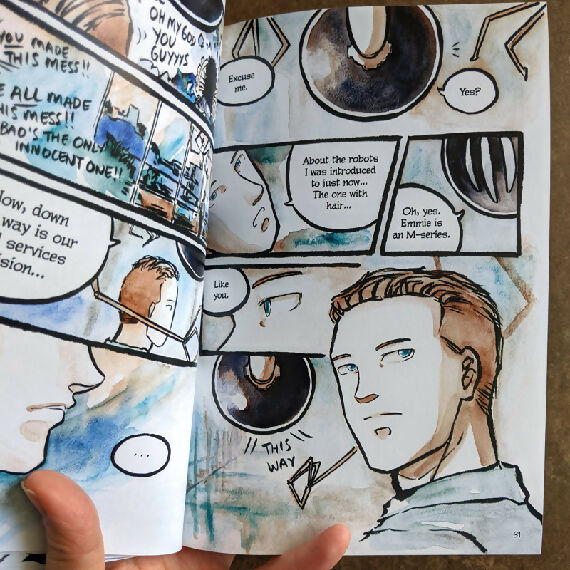 Now Recharging Book 2 opened to a spread showing the man, an android, talking to another robot.