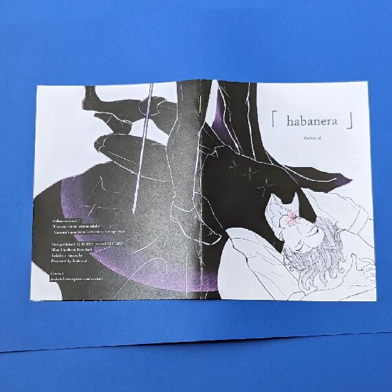 Habanera zine cover featuring Ainosuke lying on the ground was a cassia flower in his mouth