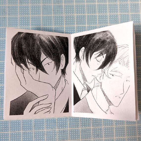 page left: Tadashi kissing Ainosuke's palm. page right: Tadashi kissing Ainosuke's ear from behind.